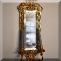 DM03. One of four antique cast metal mirrored candle sconces. 